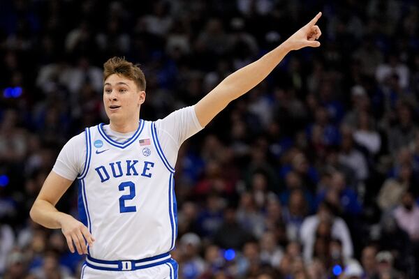Duke forward Cooper Flagg (2) motions during the first half of an Elite Eight round NCAA college basketball tournament game against the Alabama, Saturday, March 29, 2025, in Newark, N.J. (AP Photo/Julia Demaree Nikhinson)