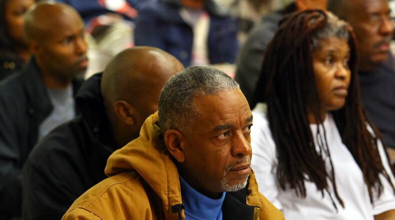 111814 COLLEGE PARK: Local resident Arthur Blanding takes notes during the Creating a City in South Fulton County information meeting at the World Changers Church International fellowship hall on Tuesday, Nov. 18, 2014, in College Park. Blanding said "I am undecided and looking for more information. That is why I am here". CURTIS COMPTON / CCOMPTON@AJC.COM Residents attend a recent meeting on a proposal to create a new city in South Fulton County.