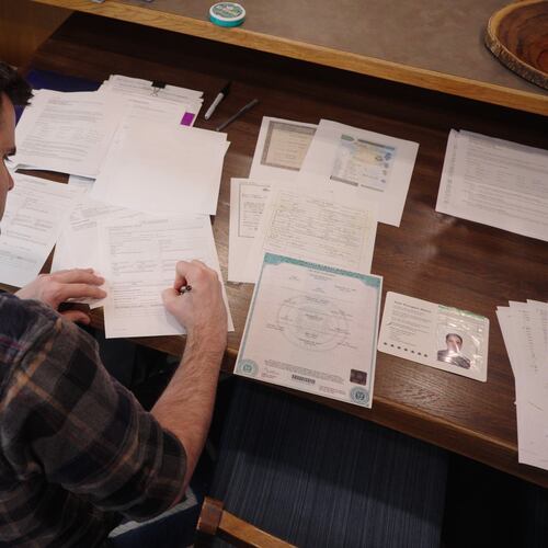 This image made from video shows Zach Loud completing his application for Canadian citizenship at his family's home in Farmington, Minn., April 17, 2026. (AP Photo/Mark Vancleave)