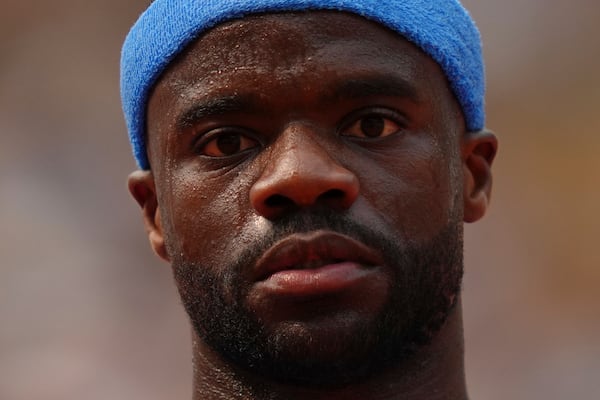 Frances Tiafoe of the U.S. reacts as he plays against Italy's Lorenzo Musetti during their quarterfinal match of the French Tennis Open at the Roland-Garros stadium in Paris, Tuesday, June 3, 2025. (AP Photo/Aurelien Morissard)