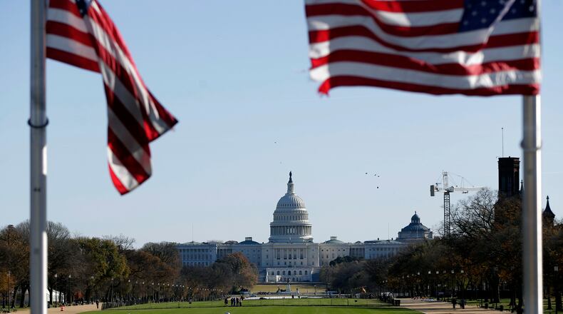 The U.S. Capitol is pictured from the base of the Washington Monument, Thursday, Nov. 13, 2025, in Washington. (AP Photo/Rahmat Gul)