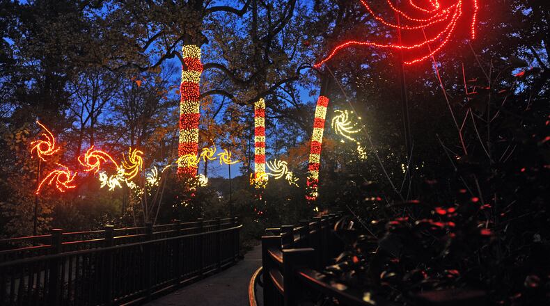 Inspired by the Van Gogh masterpiece, the Atlanta Botanical Garden's Starry Night walk sparkles with dozens of swirling stars. | Atlanta Holiday Light Displays | Holiday Events & Attractions