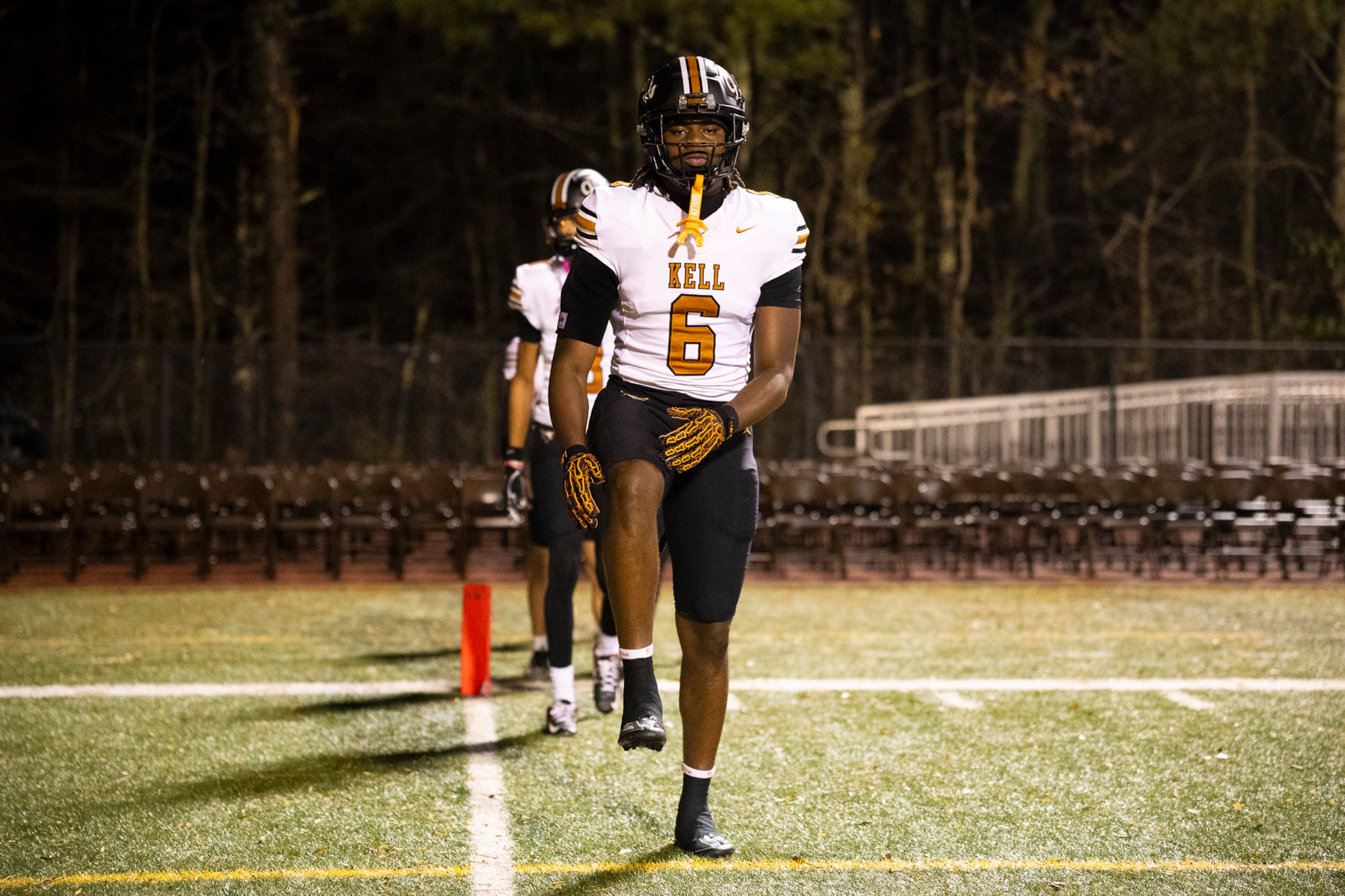 Kell tight end and Georgia Tech commit Nathan Agyemang stretches during the warmups of the class 4A semifinal against Creekside at Creekside High School in Fairburn, GA on Friday, December 5, 2025. (Oscar Guevara Saenz for the AJC)