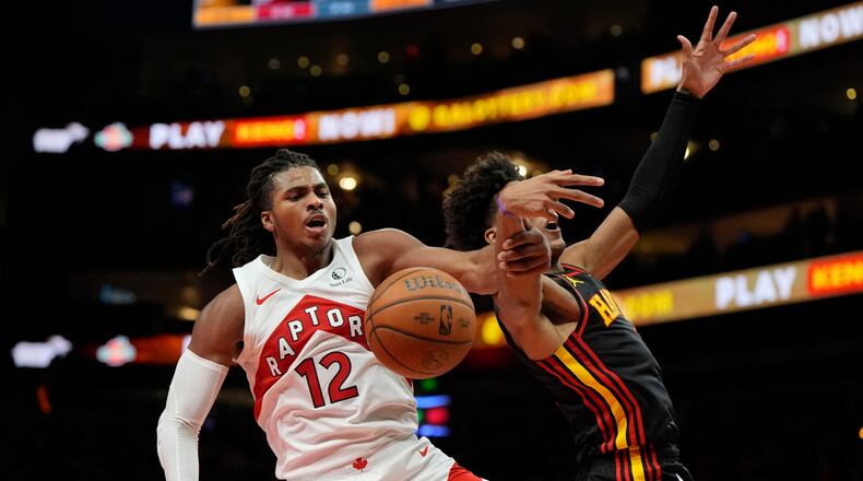 Atlanta Hawks forward Jalen Johnson had 21 points, seven rebounds and four assists in the Hawks' 109-97 loss to the Raptors on Friday. (Mike Stewart/AP)