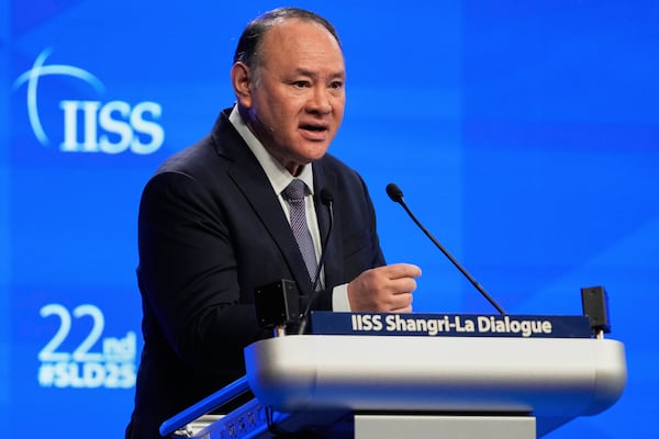 Gilberto Teodoro Jr, Secretary of National Defense of the Philippines, delivers his speech during the 22nd Shangri-La Dialogue summit in Singapore, Sunday, June 1, 2025. (AP Photo/Anupam Nath)