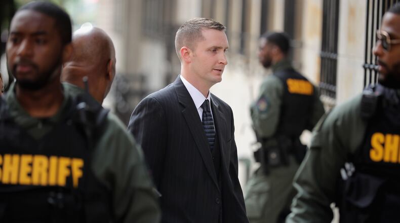 BALTIMORE, MD - MAY 23: Baltimore Police Officer Edward Nero (C) arrives at the Mitchell Courthouse-West on the day a judge will issue a vertict in his trial May 23, 2016 in Baltimore, Maryland. Nero is one of six police officers charged in the arrest and death of Freddie Gray, whose injuries while in police custody resluted in his death and sparked days of protests and riots in Baltimore last year. (Photo by Chip Somodevilla/Getty Images)