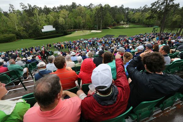 April 3, 2017, Augusta: Patrons take in Amen Corner from a tower overlooking the 11th and 12th greens during practice for the Masters at Augusta National Golf Club on Monday, April 3, 2017, in Augusta.   Curtis Compton/ccompton@ajc.com
