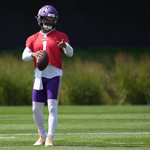 Minnesota Vikings quarterback Kyler Murray stands on the field during the NFL football team's training camp Saturday, Aug. 1, 2026, in Eagan, Minn. (AP Photo/Abbie Parr)