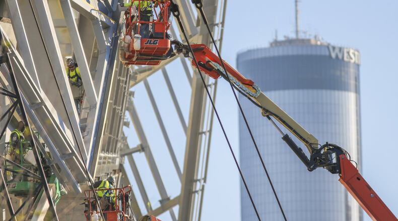Work underway in November on the $1.5 billion dollar Mercedes-Benz Stadium in downtown Atlanta, one of two major sports projects in the region that have enlarged the rolls of construction workers this year. JOHN SPINK /JSPINK@AJC.COM
