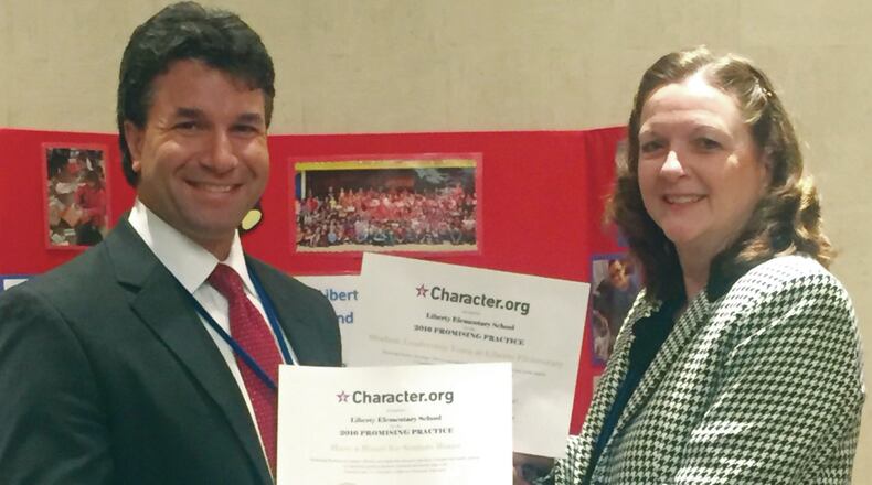 Liberty Elementary School principal Doug Knott and assistant principal Pam Green accepted the school’s award at the National Forum on Character Education in Washington., D.C.