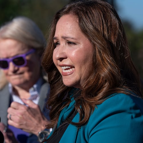 Rep.-elect Adelita Grijalva, D-Ariz., speaks as she is surrounded by supporters who have urged that House Speaker Mike Johnson swear her in, at the Capitol in Washington, Wednesday, Oct. 15, 2025. (AP Photo/J. Scott Applewhite)