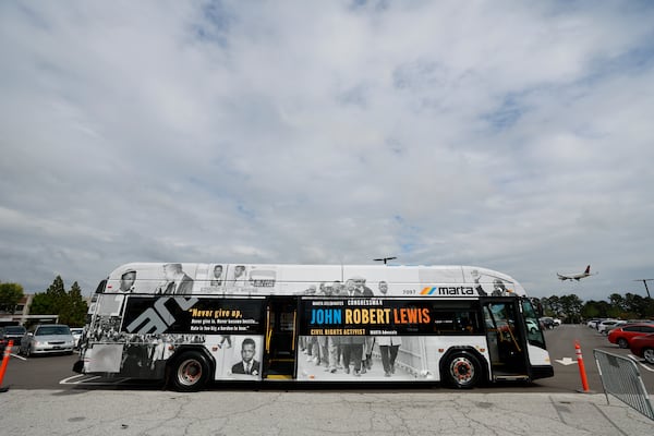 A Marta-wrapped bus honors civil rights activist John Lewis, ensuring his stories inspire future generations. (Miguel Martinez/AJC 2024)