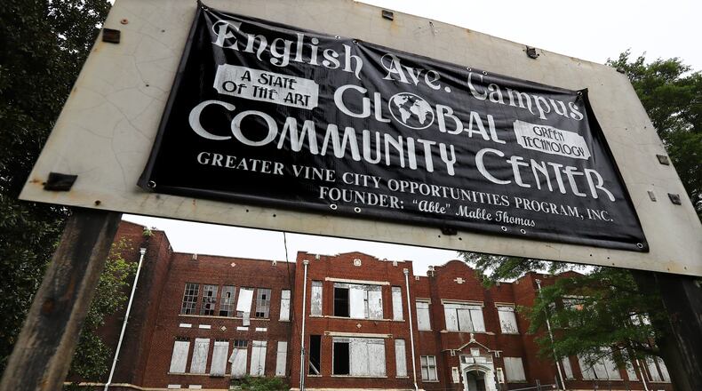 The former English Avenue Elementary School building, which was built in 1911, received national historic designation last year. In 2010, the Greater Vine City Opportunities Program purchased the former school and began a capital campaign to renovate the property into a "Global Community Center," but the concept for the renovation project has since changed. Curtis Compton ccompton@ajc.com