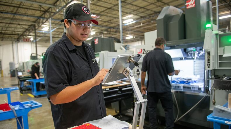Phillip Murray works on a custom prototype at Plethora in Marietta. PHOTO BY ELISSA BENZIE