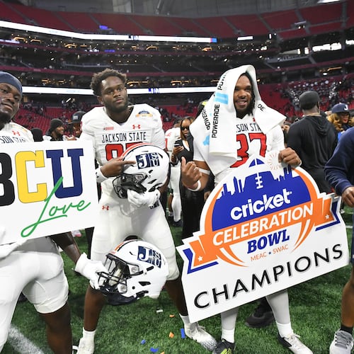 Jackson State players celebrate victory over South Carolina State in the 2024 Celebration Bowl at Mercedes-Benz Stadium. The Tigers are once again in contention for a spot in the bowl game. (Hyosub Shin/AJC 2024)