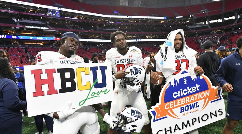 Jackson State players celebrate victory over South Carolina State in the 2024 Celebration Bowl at Mercedes-Benz Stadium. The Tigers are once again in contention for a spot in the bowl game. (Hyosub Shin/AJC 2024)