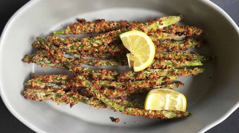 Roll your asparagus in a crispy coating to put this savory side dish in the spotlight. CONTRIBUTED BY KELLIE HYNES