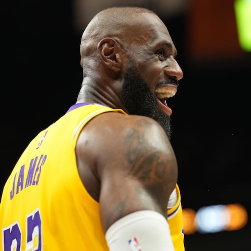 Los Angeles Lakers forward LeBron James smiles during the second half of an NBA basketball game against the Miami Heat, Thursday, March 19, 2026, in Miami. (AP Photo/Lynne Sladky)