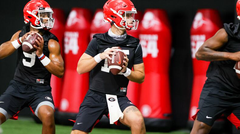 Georgia quarterback Jamie Newman (9), Georgia quarterback Carson Beck (15) during the Bulldogs’ practice in Athens, Ga., on Mon., Aug. 17, 2020. (Photo by Chamberlain Smith)