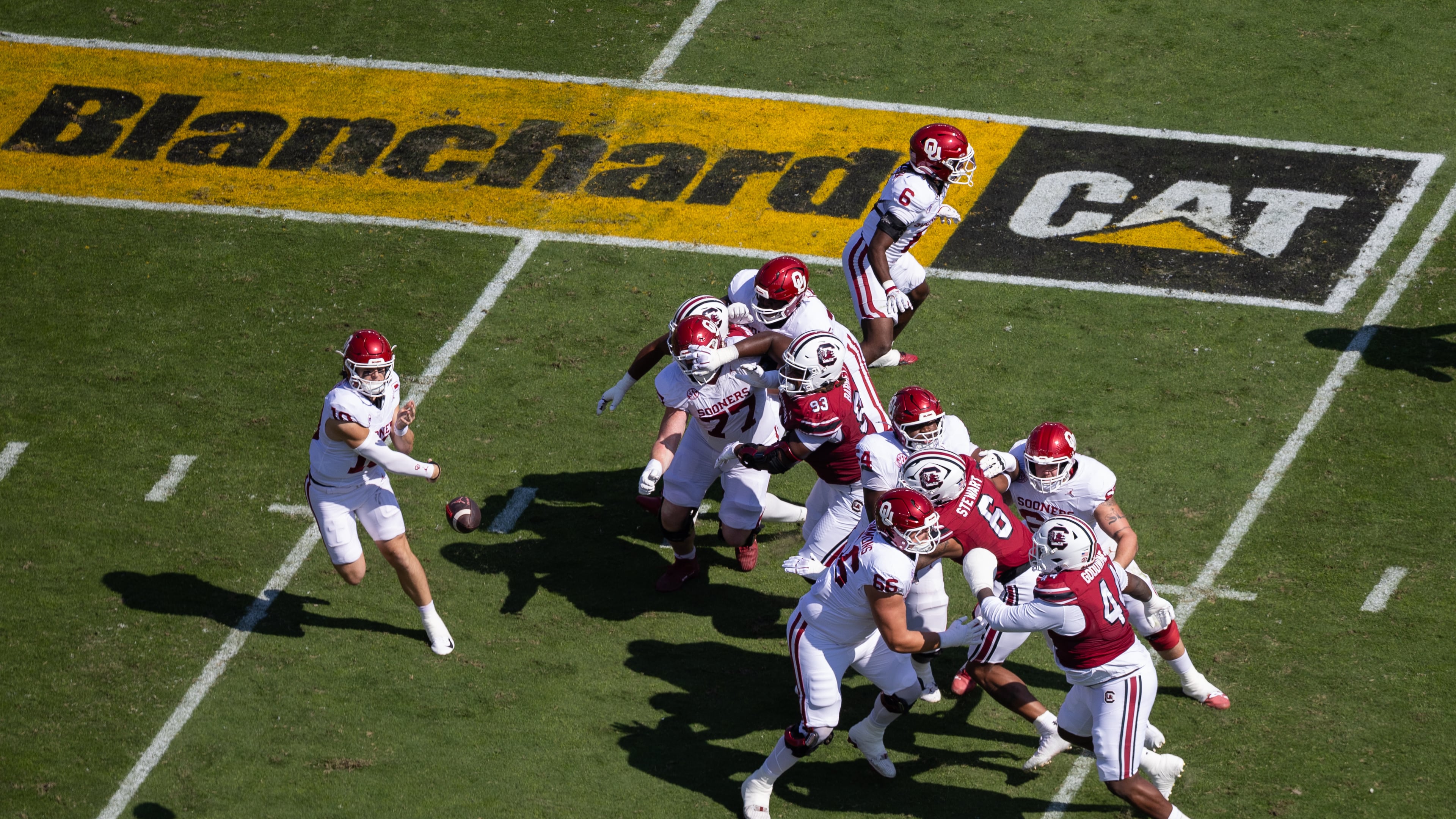 A Blanchard Cat logo is displayed on the field as Oklahoma quarterback John Mateer (10) throws against South Carolina during an NCAA college football game, Saturday, Oct. 18, 2025, in Columbia, S.C. (AP Photo/Scott Kinser)