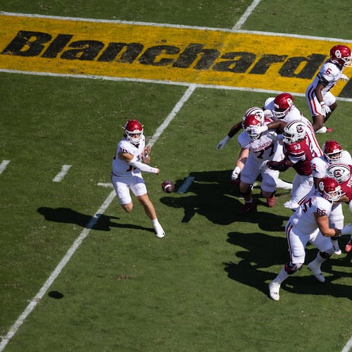 A Blanchard Cat logo is displayed on the field as Oklahoma quarterback John Mateer (10) throws against South Carolina during an NCAA college football game, Saturday, Oct. 18, 2025, in Columbia, S.C. (AP Photo/Scott Kinser)