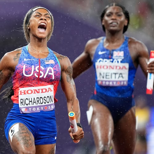 FILE - United States' Sha'Carri Richardson celebrates as she anchors the team to gold ahead of Britain's Daryll Neita in the women's 4 X 100 meters relay final at the World Athletics Championships in Tokyo, Sept. 21, 2025. (AP Photo/Petr David Josek, File)