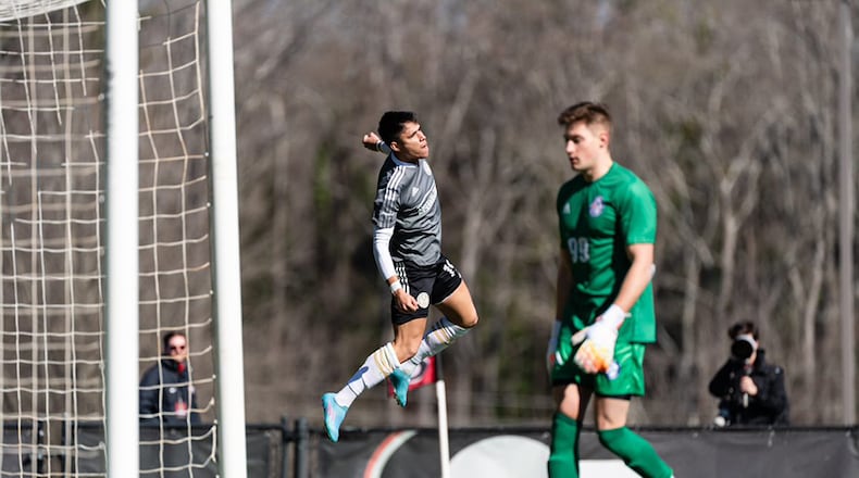 Luiz Araujo, a forward for Atlanta United, celebrates a goal against the Revolution. Araujo should be in the starting lineup Feb. 27 in the team's season opener.
