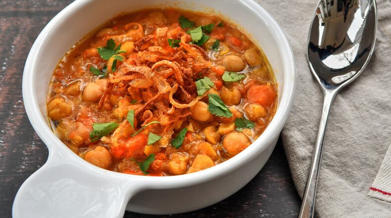 Chickpea Carrot Stew with Fried Shallots.
(Chris Hunt for The Atlanta Journal-Constitution)