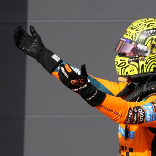 McLaren driver Lando Norris of Britain celebrates after winning the Formula One Hungarian Grand Prix auto race, at the Hungaroring racetrack in Mogyorod, near Budapest, Hungary, Sunday, July 26, 2026. (AP Photo/Darko Bandic)