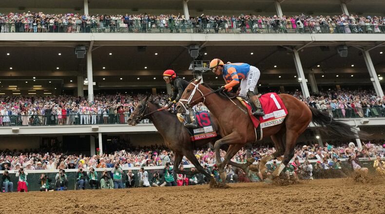Golden Tempo (19) ridden by Jose L. Ortiz wins the 152nd running of the Kentucky Derby horse race followed by Renegade (1) ridden by Irad Ortiz, Jr., at Churchill Downs, Saturday, May 2, 2026, in Louisville, Ky. (AP Photo/Abbie Parr)