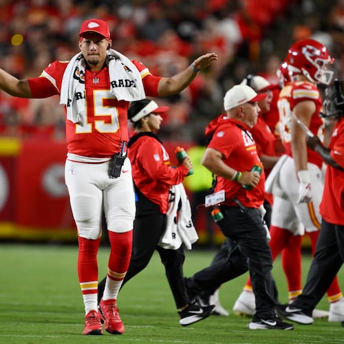 Kansas City Chiefs quarterback Patrick Mahomes (15) motions to teammates during the second half of a preseason NFL football game against the Seattle Seahawks, Friday, Aug. 28, 2026, in Kansas City, Mo. (AP Photo/Reed Hoffmann)