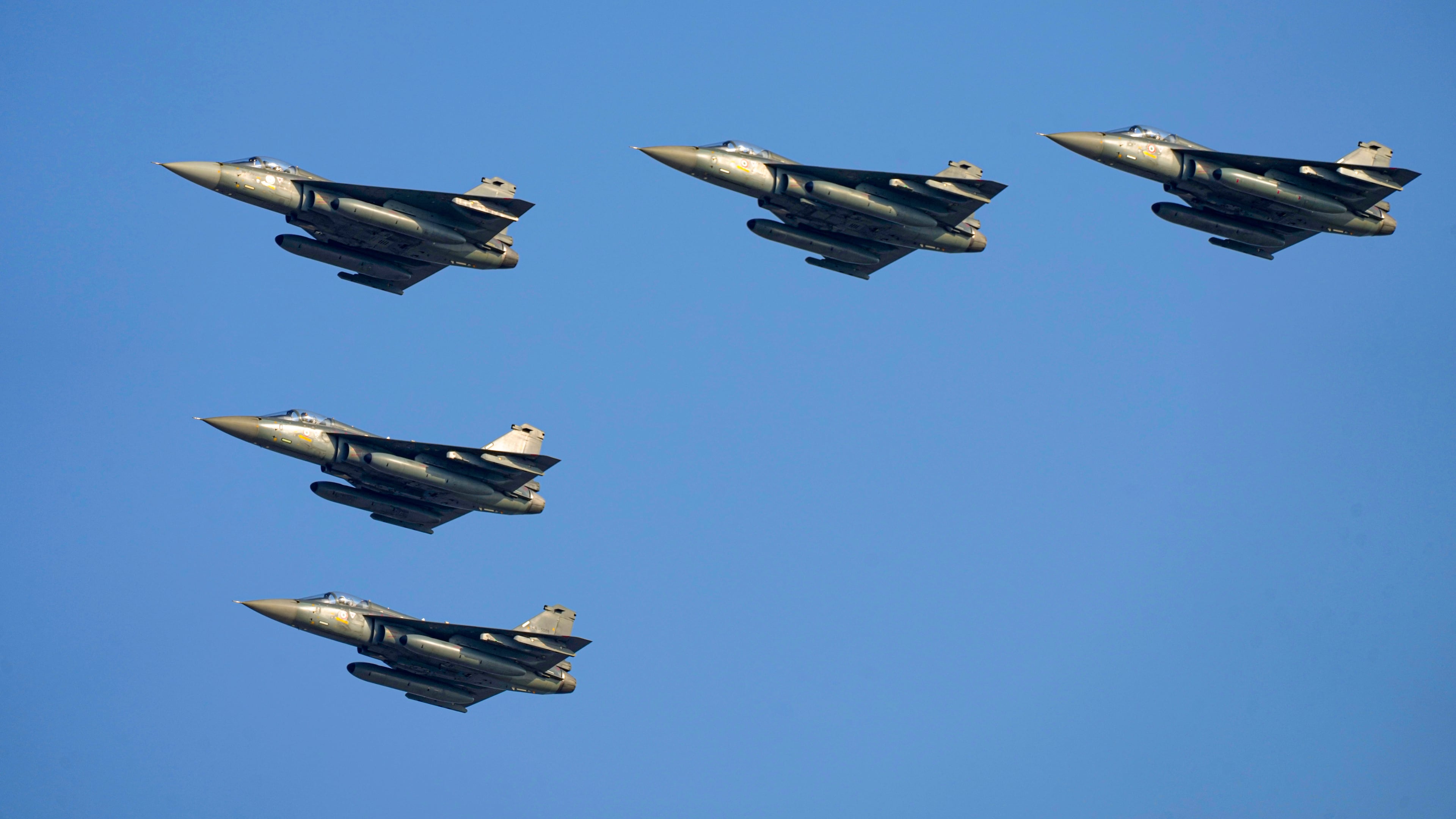 FILE -Indian Air Force fighter jets MIG-21 fly past during Air Force Day celebrations at Sangam, the holy confluence of river Ganga, Yamuna and the mythical Saraswati, in Prayagraj, India, Oct. 8, 2023. (AP Photo/Rajesh Kumar Singh, File)