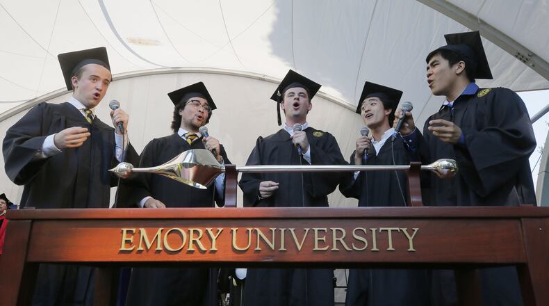 A mix of juniors and graduates sing Emory’s Alma Mater to close its 2018 Commencement. After closing campus in mid-March due to the coronavirus pandemic, Emory is planning in-person classes in the fall. BOB ANDRES / BANDRES@AJC.COM