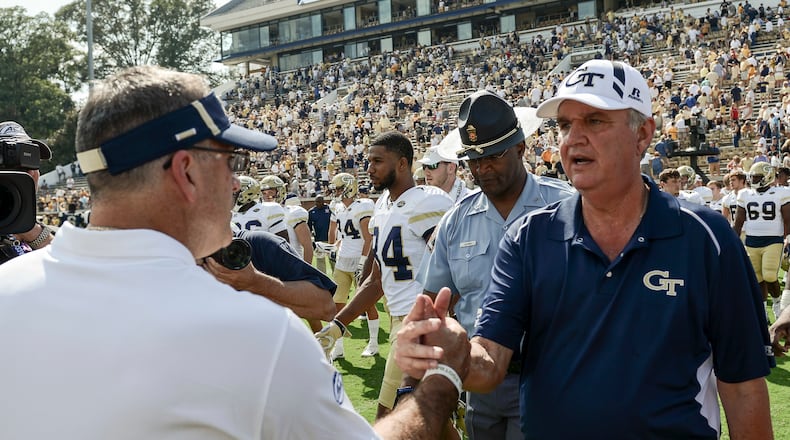Georgia Tech coach Paul Johnson, right, speaks with Pittsburgh coach Pat Narduzzi after an NCAA college football game, Saturday, Sept. 23, 2017, in Atlanta. Georgia Tech won 35-17. (AP Photo/Jon Barash)