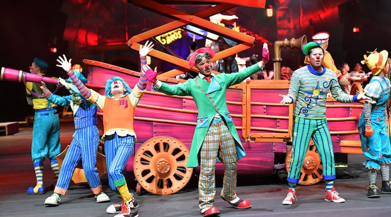 Ringling Bros. and Barnum & Bailey performers are seen during a show at Philips Arena on a recent day. Ivan Vargas is far right with the sideways hat. Matthew Lish is holding the telescope. HYOSUB SHIN / HSHIN@AJC.COM