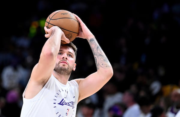 Los Angeles Lakers guard Luka Doncic warms-up before an NBA basketball game against the Chicago Bulls Saturday, March 22, 2025, in Los Angeles. (AP Photo/Wally Skalij)