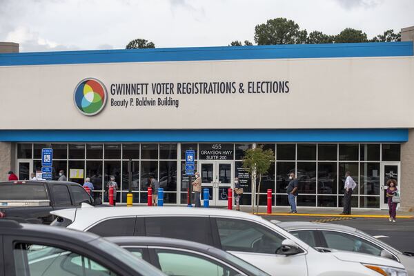 Lawrenceville, Georgia - Voters participate in social distancing as they wait for access for early in-person voting at the Gwinnett County Voter Registration and Elections Office in Lawrenceville, Monday, May 18, 2020. (ALYSSA POINTER / ALYSSA.POINTER@AJC.COM) AJC FILE PHOTO