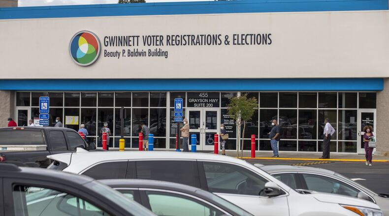 Lawrenceville, Georgia - Voters participate in social distancing as they wait for access for early in-person voting at the Gwinnett County Voter Registration and Elections Office in Lawrenceville, Monday, May 18, 2020. (ALYSSA POINTER / ALYSSA.POINTER@AJC.COM) AJC FILE PHOTO