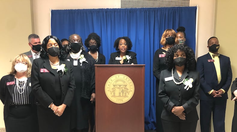 Legislators led by state Rep. Kim Schofield spoke at a press conference Tuesday about sexual harassment and misogyny at the Georgia Capitol. MARK NIESSE / MARK.NIESSE@AJC.COM