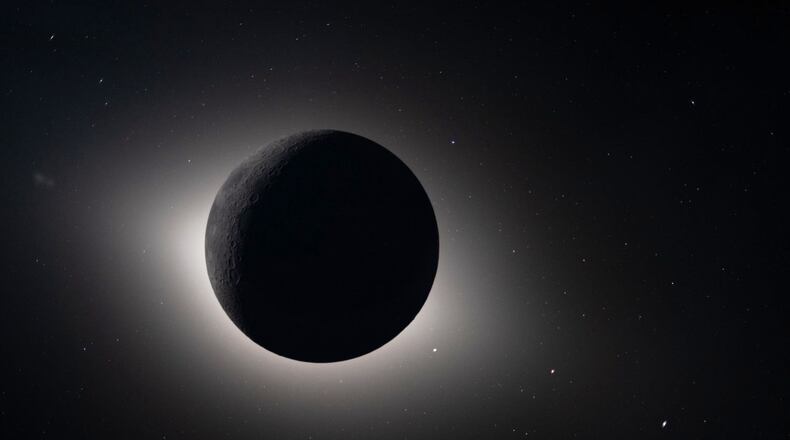 FILE - In this photo provided by NASA and captured by the Artemis II crew from lunar orbit, the Moon eclipses the Sun on April 6, 2026. (NASA via AP, File)