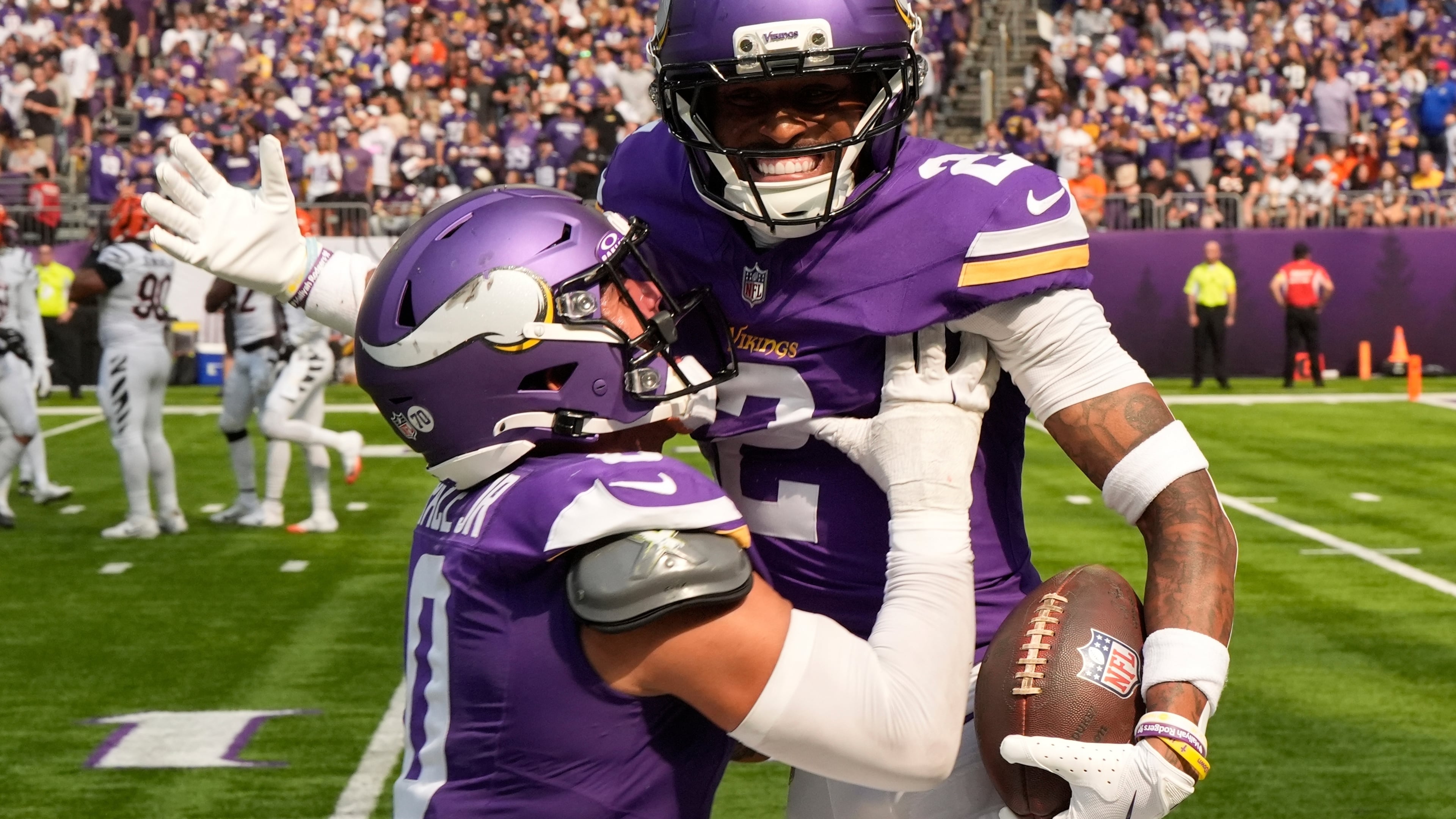 Minnesota Vikings cornerback Isaiah Rodgers (2) celebrates his touchdown with linebacker Ivan Pace Jr. during the first half of an NFL football game against the Cincinnati Bengals, Sunday, Sept. 21, 2025, in Minneapolis. (AP Photo/Mike Stewart)
