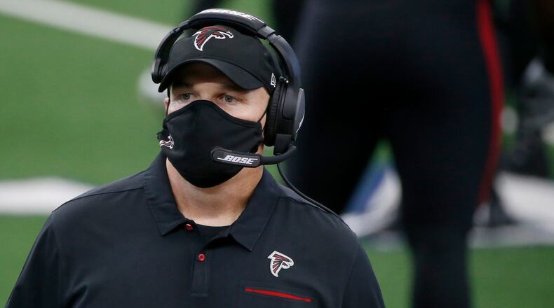 Atlanta Falcons head coach Dan Quinn watches a play against the Dallas Cowboys Sunday, Sept. 20, 2020, in Arlington, Texas. (Michael Ainsworth/AP)