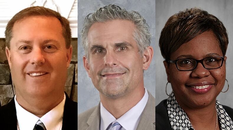 The DeKalb County Board of Education approved three new hires recently: (from left) Erick Hofstetter, chief operations officer; Norman Sauce, regional superintendent; and Jacqueline Taylor, regional superintendent.