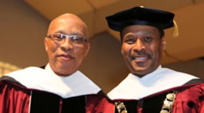 Morehouse College Board of Trustees chairman Robert Davidson, left, and the college’s president, John S. Wilson. (Photo Credit: Morehouse College.) The releasing of Wilson as president has caused some turmoil on campus and among graduates.