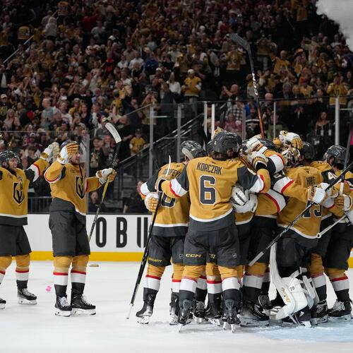 Vegas Golden Knights players celebrate after winning Game 4 of the Western Conference finals NHL hockey Stanley Cup playoff series against the Colorado Avalanche Tuesday, May 26, 2026, in Las Vegas. (AP Photo/John Locher)