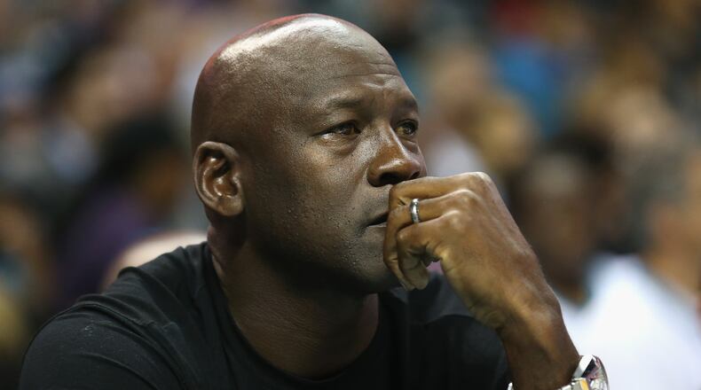 Owner of the Charlotte Hornets, Michael Jordan, watches on during their game against the Atlanta Hawks at Time Warner Cable Arena on Nov. 1, 2015, in Charlotte, North Carolina. (Photo by Streeter Lecka/Getty Images)