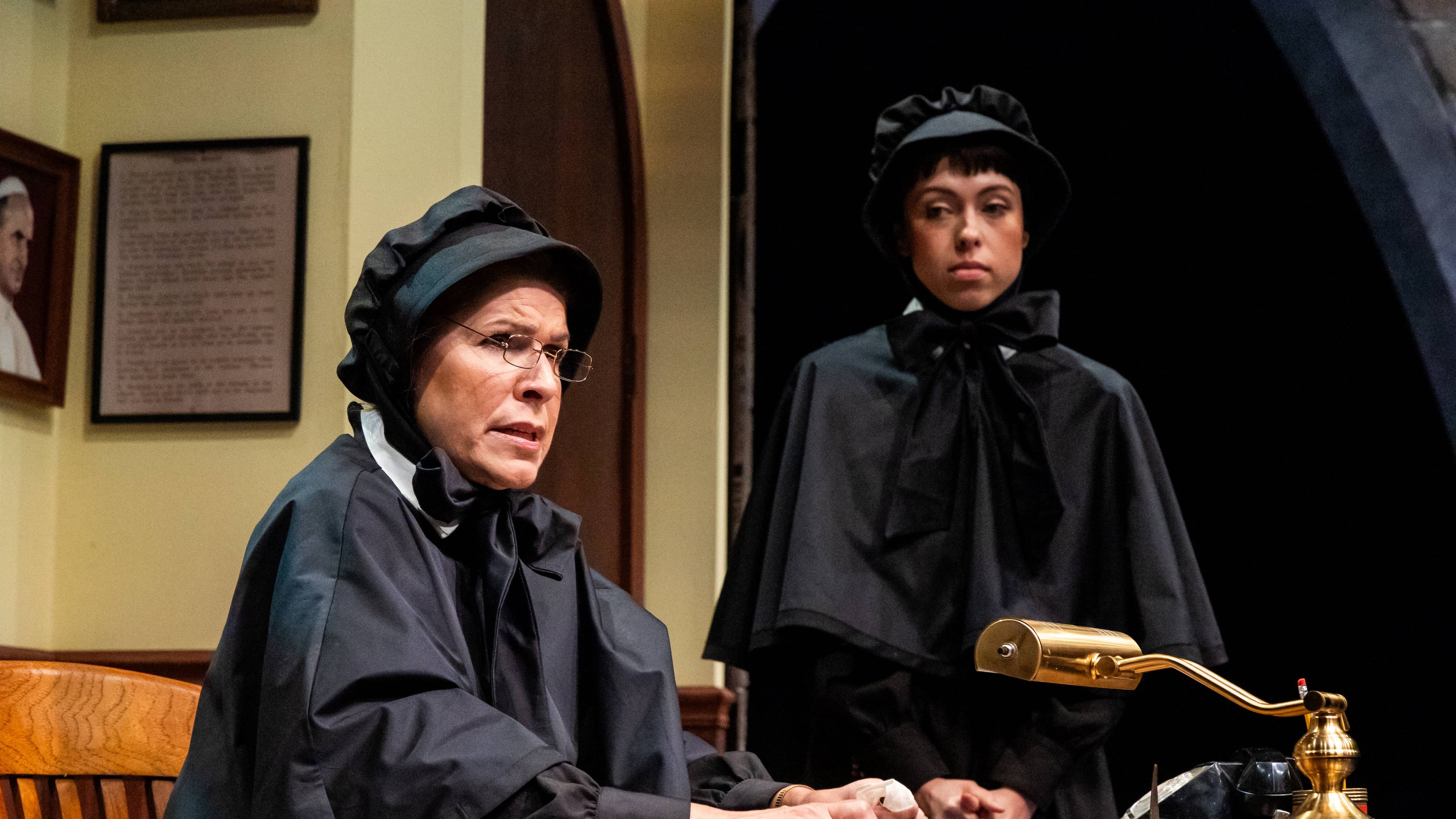 Tess Malis Kincaid (left), is strong in the pivotal role of Catholic school leader Sister Aloysius, and Sarah Velasco shines as the naive and optimistic Sister James in "Doubt: A Parable" at Actor's Express. (Courtesy of Casey Gardner Ford)