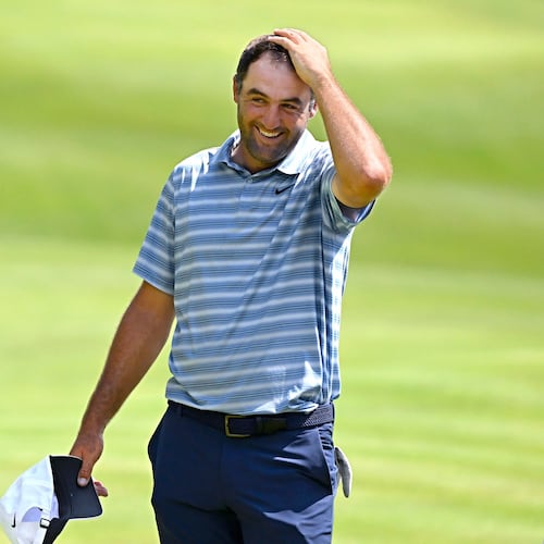 Scottie Scheffler reacts after finishing the second round of the Travelers Championship golf tournament at TPC River Highlands, Friday, June 26, 2026, in Cromwell, Conn. (AP Photo/Jessica Hill)