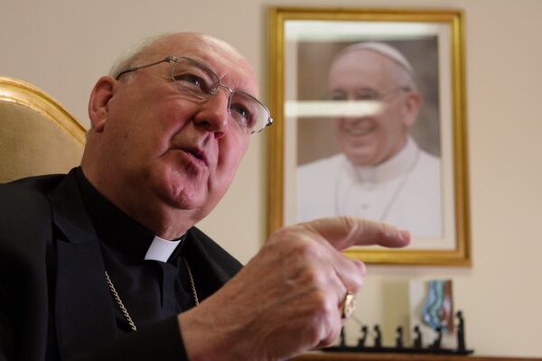 FILE - Cardinal Kevin Farrell talks during an interview with The Associated Press in his office in Rome on July 31, 2018. (AP Photo/Paolo Santalucia, File)
