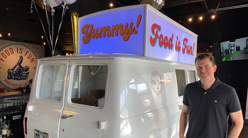 Justin Wilfon left WSB-TV after seven years last month. He started a PR firm with his wife and is helping run a new restaurant Marietta Melt Yard. RODNEY HO/rho@ajc.com